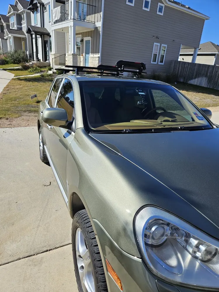 Green Porsche Cayenne photographed by Trenton Tucker in his Google review