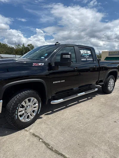 Black Chevrolet Silverado with a deep, glossy finish